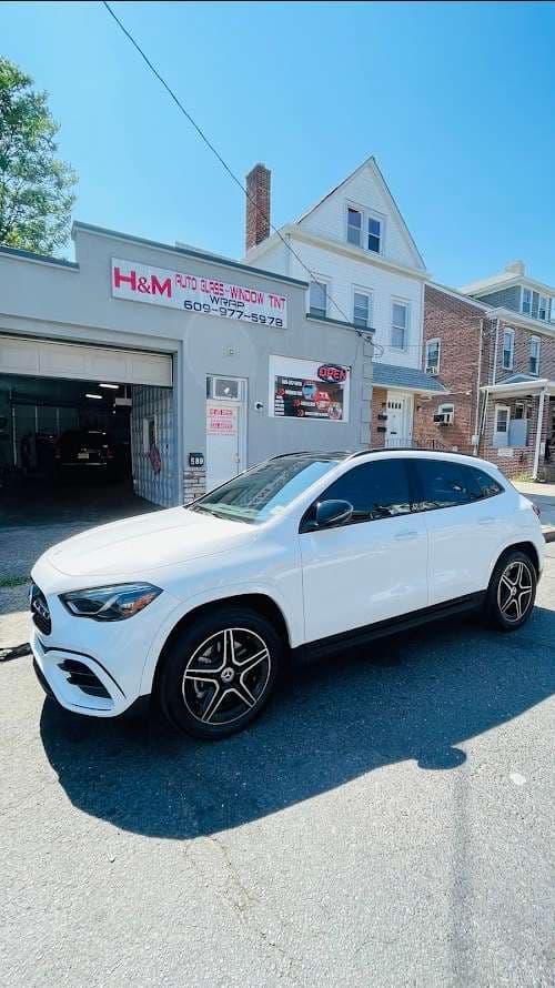 Image of H&M Auto glass, Window tint, Truck lettering